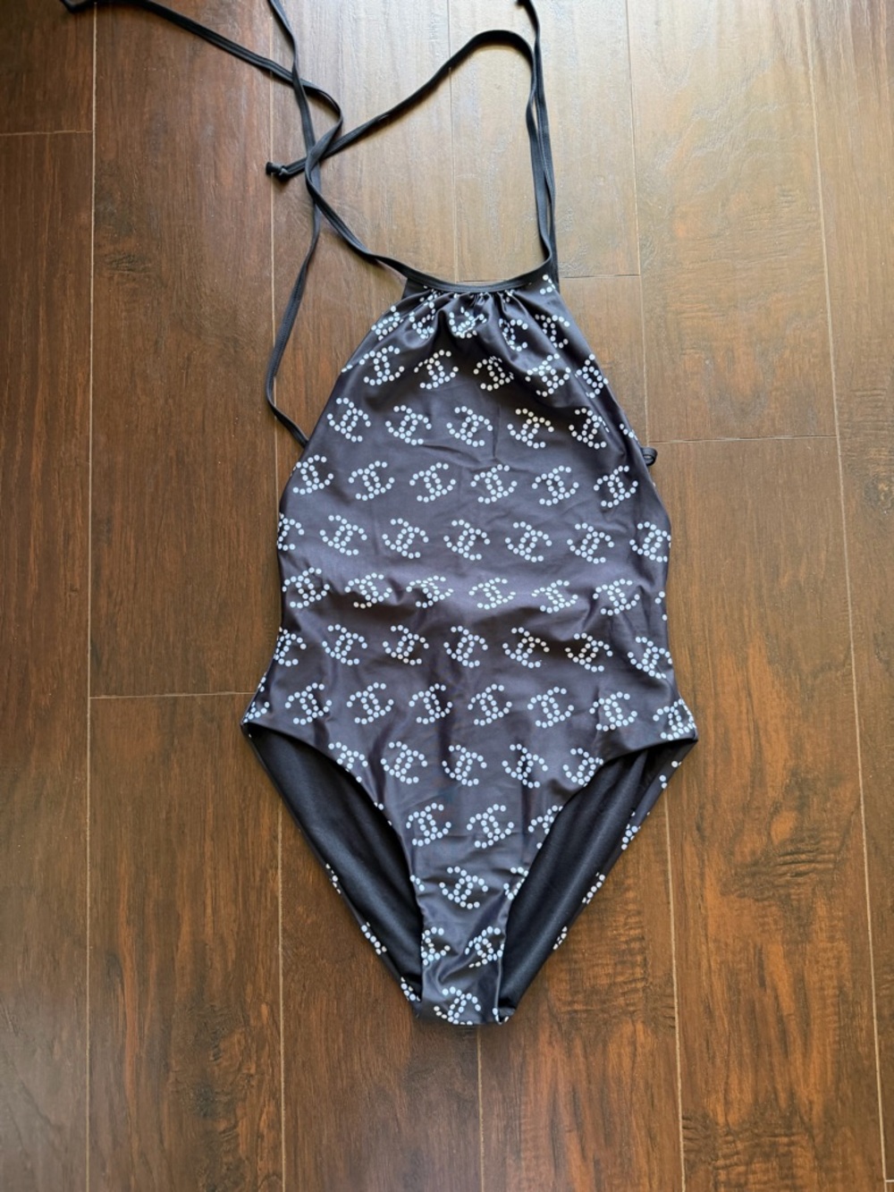 Women Black Halter One-Piece Swimsuit with White Dot Logo Pattern